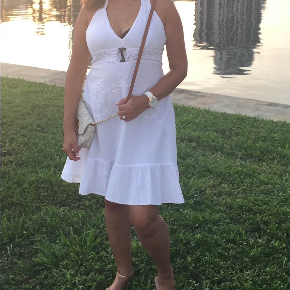 Giocam white dress. Halter neck. Like new. Wore a couple times. Size M